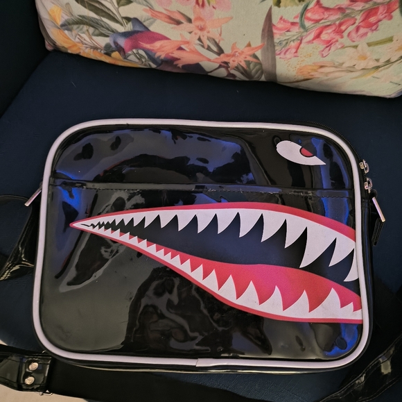 Stylish Black Crossbody Bag with Bold Design